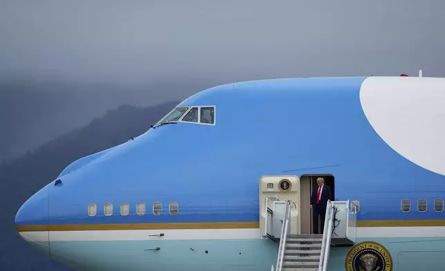 President Donald Trump arrives on Air Force One, Friday, Aug. 15, 2025, at Joint Base Elmendorf-Richardson, Alaska, to meet with Russia's President Vladimir Putin. (AP Photo/Julia Demaree Nikhinson)