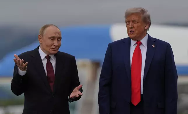 President Donald Trump talks with Russia's President Vladimir Putin Friday, Aug. 15, 2025, at Joint Base Elmendorf-Richardson, Alaska. (AP Photo/Julia Demaree Nikhinson)