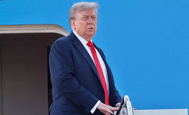 President Donald Trump boards Air Force One at Joint Base Andrews, Md., Friday, Aug. 15, 2025, en route to a meeting with Russian President Vladimir Putin in Alaska. (AP Photo/Luis M. Alvarez)