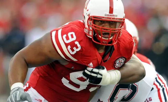 FILE - In this Sept. 5, 2009, file photo, Nebraska's Ndamukong Suh (93) rushes against a Florida Atlantic player during an NCAA football game in Lincoln, Neb. (AP Photo/Dave Weaver, File)