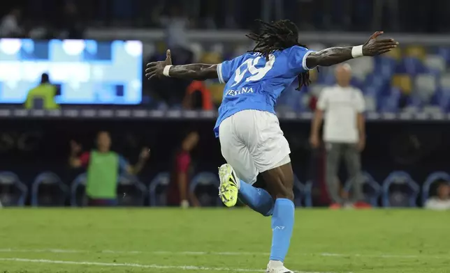Napoli's Andre-Frank Zambo Anguissa celebrates after scoring a goal during the Serie A soccer match between Napoli and Cagliari at the Diego Armando Maradona Stadium in Naples, southern Italy, Saturday, Aug. 30, 2025. (Alessandro Garofalo/LaPresse via AP)