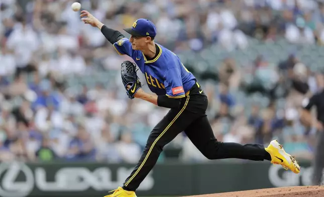 Seattle Mariners starting pitcher George Kirby throws against the Texas Rangers during the first inning in a baseball game Thursday, July 31, 2025, in Seattle. (AP Photo/John Froschauer)
