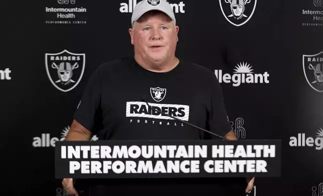 Las Vegas Raiders offensive coordinator Chip Kelly speaks to media during the team's NFL football training camp Thursday, July 24, 2025, in Henderson, Nev. (AP Photo/Ian Maule)