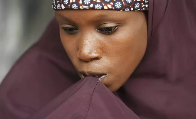 Aisha Muhammed, a 25-year-old woman, who had eclampsia, is interviewed at her house at her house in Konduga, in northeast Nigeria's Borno state, Wednesday, July 23, 2025. (AP Photo/Sunday Alamba)