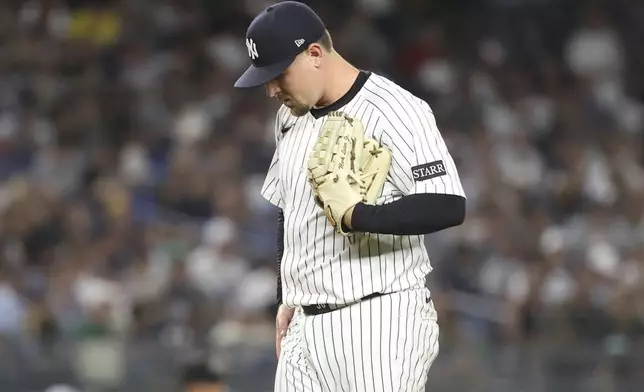 New York Yankees pitcher Mark Leiter Jr. stands on the field during the seventh inning of a baseball game against the Boston Red Sox, Friday, Aug. 22, 2025, in New York. (AP Photo/Pamela Smith)
