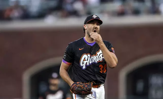 Robbie Ray (38) reacts after giving up a two-run homerun in the second inning as the San Francisco Giants played the San Diego Padres at Oracle Park in San Francisco, on Tuesday, Aug. 12, 2025.(Carlos Avila Gonzalez/San Francisco Chronicle via AP)