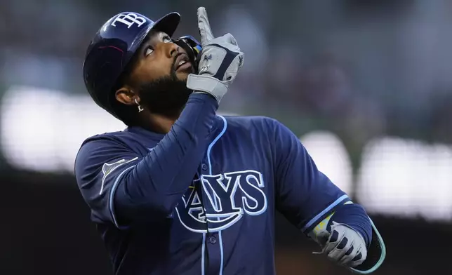 Tampa Bay Rays' Junior Caminero celebrates after hitting a solo home run during the second inning of a baseball game against the San Francisco Giants, Friday, Aug. 15, 2025, in San Francisco. (AP Photo/Godofredo A. Vásquez)