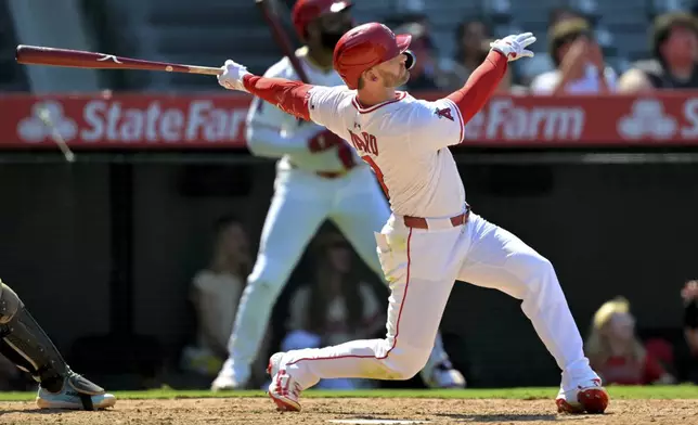 Los Angeles Angels' Taylor Ward watches his three-run walkoff home run during the ninth inning of a baseball game against the Chicago White Sox, Sunday, Aug. 3, 2025, in Anaheim, Calif. (AP Photo/Jayne Kamin-Oncea)