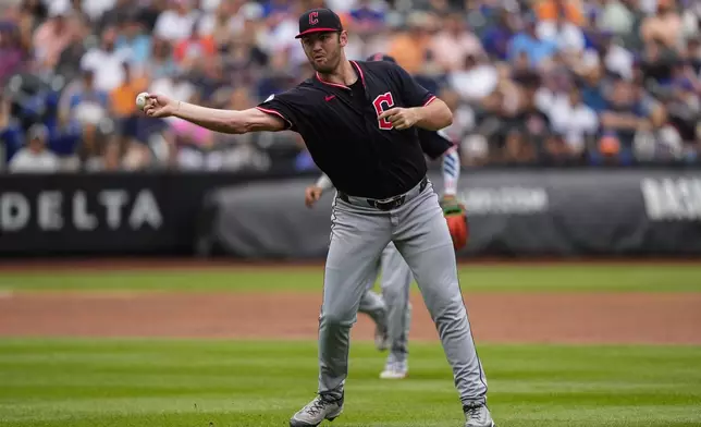 Cleveland Guardians pitcher Gavin Williams (32) throws out New York Mets' Francisco Lindor at first base during the first inning of a baseball game against the New York Mets, Wednesday, Aug. 6, 2025, in New York. (AP Photo/Yuki Iwamura)