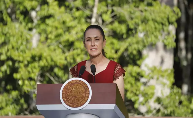 Mexican President Claudia Sheinbaum talks to reporters during a joint press conference, in Calakmul, Campeche state, Mexico, Friday, Aug. 15, 2025. (AP Photo/Martin Zetina)