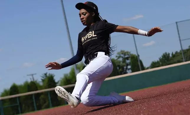 Mo'ne Davis slides to third base during the first day of tryouts for the Women's Professional Baseball League, Friday, Aug. 22, 2025, at the Washington Nationals Youth Baseball Academy in Washington. (AP Photo/Julia Demaree Nikhinson)