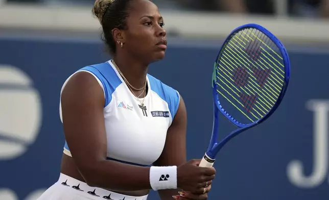 Taylor Townsend, of the United States, gets set to receive during her doubles match with her partner, with Katerina Siniakova, of the Czech Republic, against Aldila Sutjiadi, of Indonesia, and Nadiia Kichenok, of Ukraine, in the second round of the U.S. Open tennis championships, Thursday, Aug. 28, 2025, in New York. (AP Photo/Frank Franklin II)