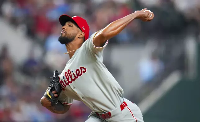 Philadelphia Phillies pitcher Cristopher Sánchez throws a pitch to the Texas Rangers during the first inning of a baseball game Friday, Aug. 8, 2025, in Arlington, Texas. (AP Photo/Julio Cortez)