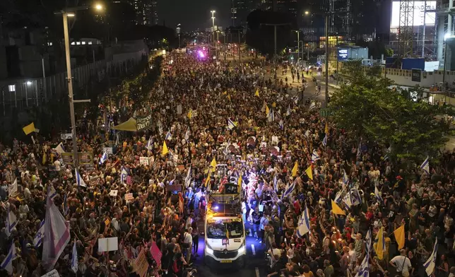 Relatives and supporters of Israeli hostages held in the Gaza Strip attend a rally demanding their release from Hamas captivity and calling for an end to the war, in Tel Aviv, Israel, Saturday, Aug. 9, 2025. (AP Photo/Ohad Zwigenberg)