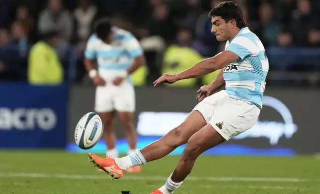 Argentina's Los Pumas Santiago Carreras kicks a penalty against New Zealand's All Blacks during a rugby championship match in Buenos Aires, Argentina, Saturday, Aug. 23, 2025. (AP Photo/Gustavo Garello)