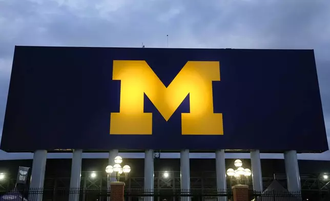 FILE - The block M logo for the University of Michigan is displayed at the school's NCAA college football stadium in Ann Arbor, Mich., Nov. 10, 2023. (AP Photo/Paul Sancya, File)
