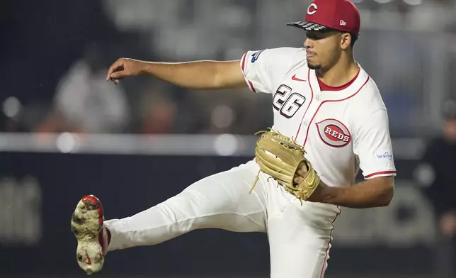 Cincinnati Reds pitcher Chase Burns throws against the Cincinnati Reds during the first inning of the MLB Speedway Classic baseball game at Bristol Motor Speedway in Bristol, Tenn., Saturday, Aug. 2, 2025. (AP Photo/Chris Carlson)
