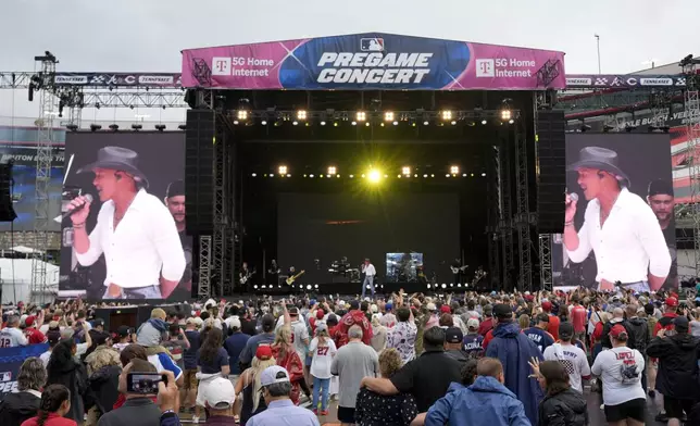 Tim McGraw performs pregame at the MLB Speedway Classic baseball game between the Atlanta Braves and the Cincinnati Reds at Bristol Motor Speedway in Bristol, Tenn., Saturday, Aug. 2, 2025. (AP Photo/George Walker IV)