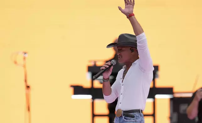 Tim McGraw performs pregame at the MLB Speedway Classic baseball game between the Atlanta Braves and the Cincinnati Reds at Bristol Motor Speedway in Bristol, Tenn., Saturday, Aug. 2, 2025. (AP Photo/George Walker IV)