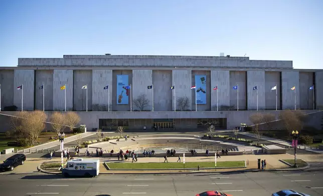 FILE - People visit the Smithsonian Museum of American History on the National Mall in Washington, April 3, 2019. (AP Photo/Pablo Martinez Monsivais, File)