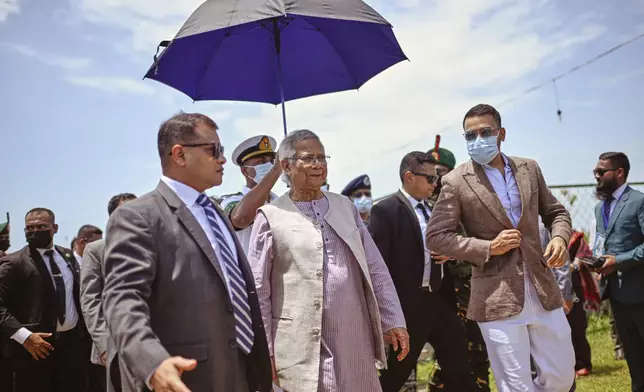 Chief Adviser Professor Muhammad Yunus, a Nobel Peace Prize laureate, leaves after attending a stakeholders' dialogue on the Rohingya situation in Cox's Bazar, Bangladesh, on Monday, Aug. 25, 2025. (AP Photo/Mahmud Hossain Opu)