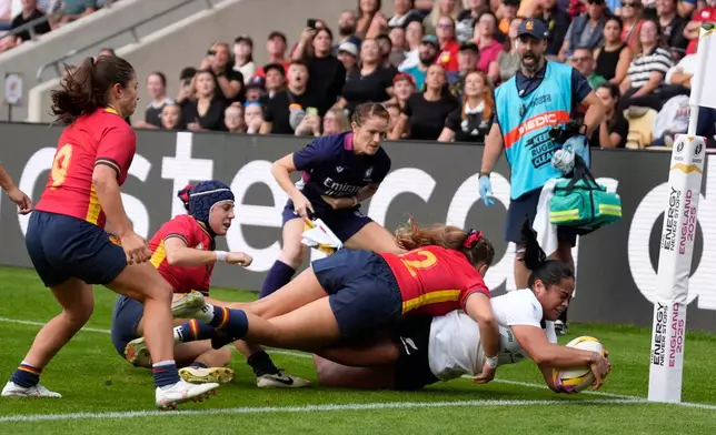 New Zealand's Ayesha Leti-I'iga scores a try during the Women's Rugby World Cup 2025 Pool C match between New Zealand and Spain at York Community Stadium in York, England, Sunday, Aug. 24, 2025. (Danny Lawson/PA via AP)
