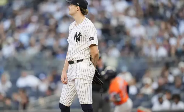 New York Yankees pitcher Cam Schlittler reacts as Houston Astros' Jose Altuve runs the bases after hitting a two-run home run during the first inning of a baseball game Friday, Aug. 8, 2025, in New York. (AP Photo/Frank Franklin II)