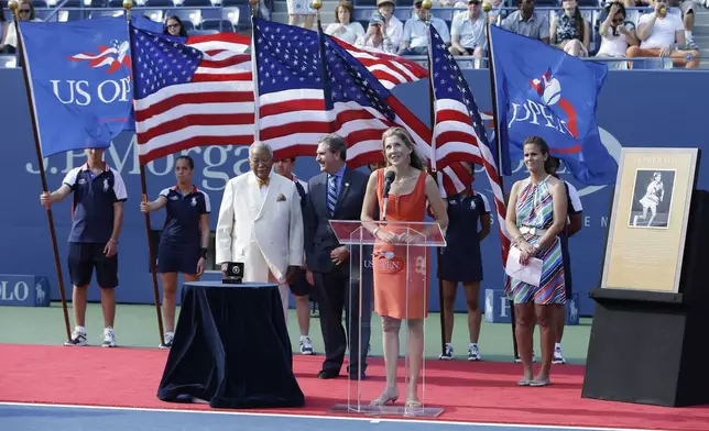 FILE - Monica Seles speaks at her induction into the Court of Champions during a ceremony before the women's singles final of the 2013 U.S. Open tennis tournament, Sept. 8, 2013, in New York. (AP Photo/Darron Cummings, file)