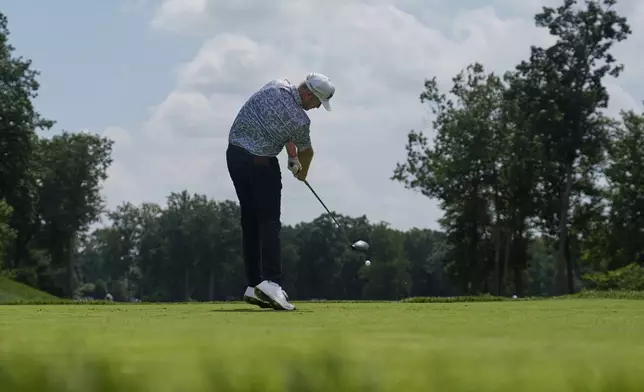 Taylor Pendrith, of Canada, hits from the fourth tee during the third round of the BMW Championship golf tournament Saturday, Aug. 16, 2025, in Owings Mills, Md. (AP Photo/Stephanie Scarbrough)