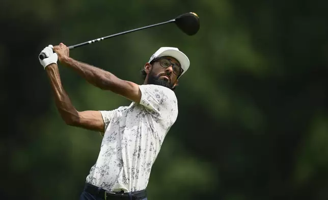 Akshay Bhatia hits from the seventh tee during the first round of the BMW Championship golf tournament Thursday, Aug. 14, 2025, in Owings Mills, Md. (AP Photo/Nick Wass)