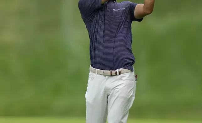 Michael Kim hits on the fourth hole during the third round of the BMW Championship golf tournament Saturday, Aug. 16, 2025, in Owings Mills, Md. (AP Photo/Stephanie Scarbrough)