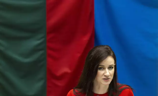 Lithuania's Social Democratic party member Inga Ruginiene, nominated as the next Prime Minister, speaks during a Lithuania's parliament session in Vilnius, Lithuania, Tuesday, Aug. 26, 2025. (AP Photo/Mindaugas Kulbis)