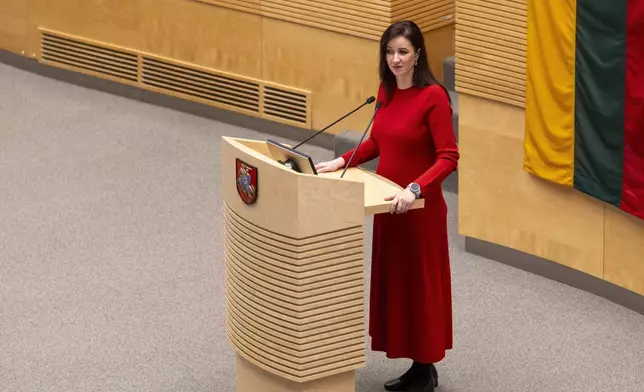 Lithuania's Social Democratic party member Inga Ruginiene, nominated as the next Prime Minister, speaks during a Lithuania's parliament session in Vilnius, Lithuania, Tuesday, Aug. 26, 2025. (AP Photo/Mindaugas Kulbis)