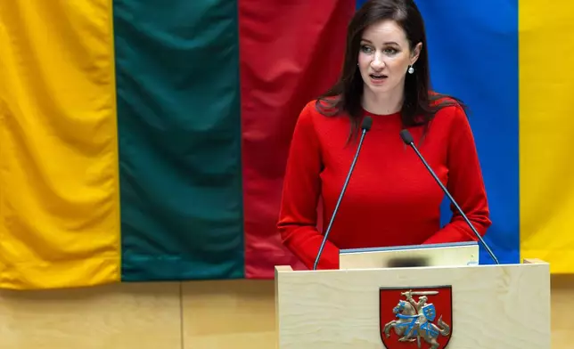 Lithuania's Social Democratic party member Inga Ruginiene, nominated as the next Prime Minister, speaks during a Lithuania's parliament session in Vilnius, Lithuania, Tuesday, Aug. 26, 2025. (AP Photo/Mindaugas Kulbis)