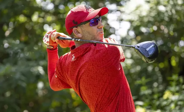 Captain Sergio Garcia, of Fireballs GC, hits from the 17th tee during the final round of LIV Golf Indianapolis at The Club at Chatham Hills, Sunday, Aug. 17, 2025, in Westfield, Ind. (Jon Ferrey/LIV Golf via AP)