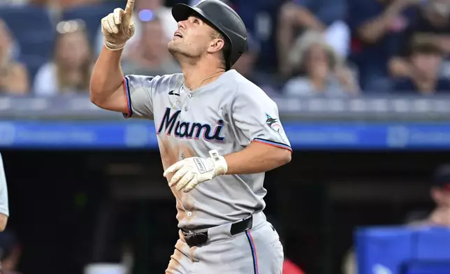 Miami Marlins' Jakob Marsee runs the bases after hitting a two-run home run off Cleveland Guardians relief pitcher Matt Festa during the fifth inning of a baseball game, Wednesday, Aug. 13, 2025, in Cleveland. (AP Photo/David Dermer)