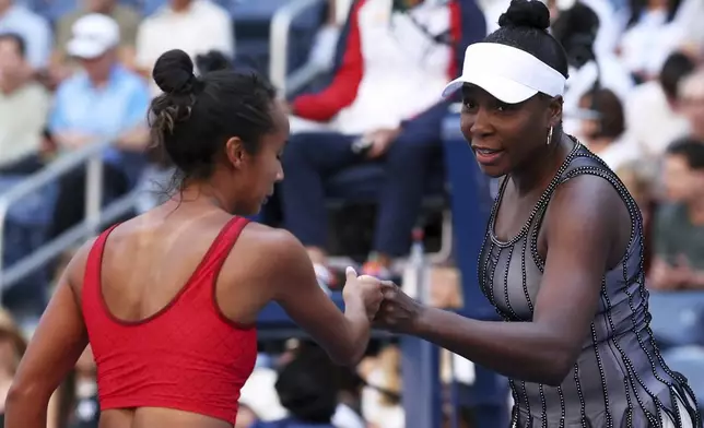 Venus Williams, of the United States, and Leylah Fernandez, of Canada, celebrate during their doubles match during the third round of the U.S. Open tennis championships, Saturday, Aug. 30, 2025, in New York. (AP Photo/Heather Khalifa)