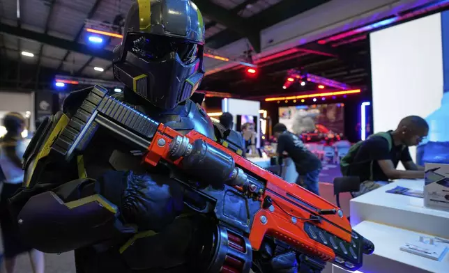 A man dressed up as a robot attends the Comic Con Festival in Johannesburg, South Africa, Saturday, Aug. 30, 2025. (AP Photo/Themba Hadebe)