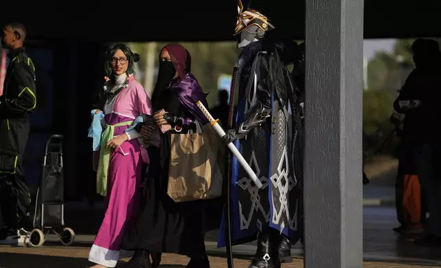 People attend the Comic Con Festival in Johannesburg, South Africa, Saturday, Aug. 30, 2025. (AP Photo/Themba Hadebe)