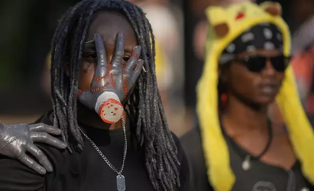 People attend the Comic Con Festival in Johannesburg, South Africa, Saturday, Aug. 30, 2025. (AP Photo/Themba Hadebe)