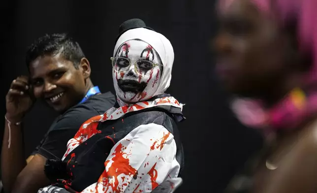 People attend the Comic Con Festival in Johannesburg, South Africa, Saturday, Aug. 30, 2025. (AP Photo/Themba Hadebe)