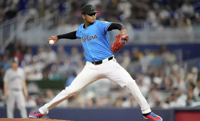 Miami Marlins starting pitcher Edward Cabrera (27) pitches during the first inning of a baseball game against the New York Yankees, Sunday, Aug. 3, 2025, in Miami. (AP Photo/Rebecca Blackwell)