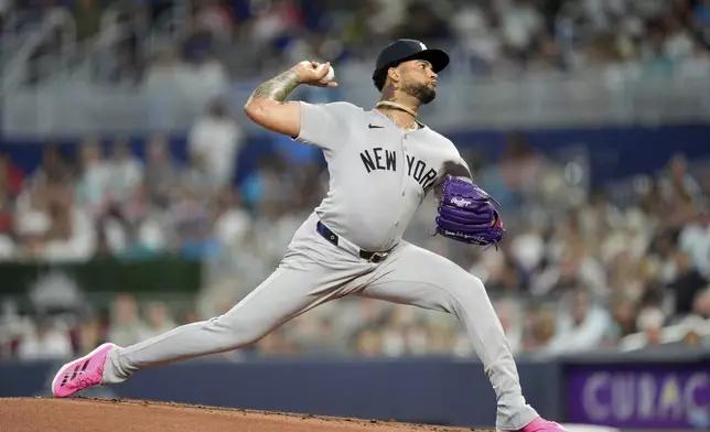 New York Yankees starting pitcher Luis Gil pitches during the first inning of a baseball game against the Miami Marlins, Sunday, Aug. 3, 2025, in Miami. (AP Photo/Rebecca Blackwell)