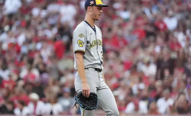 Milwaukee Brewers' Jacob Misiorowski exits the game in the second inning of a baseball game Cincinnati Reds, Friday, Aug. 15, 2025, in Cincinnati. (AP Photo/Kareem Elgazzar)