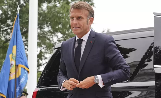 France's President Emmanuel Macron arrives to meet with President Donald Trump and Ukraine's President Volodymyr Zelenskyy, Monday, Aug. 18, 2025, at the South Portico of the White House in Washington. (AP Photo/Jacquelyn Martin)