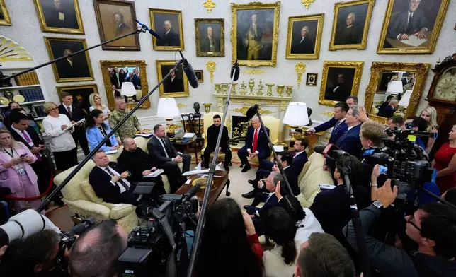 President Donald Trump speaks with Ukraine's President Volodymyr Zelenskyy in the Oval Office of the White House, Monday, Aug. 18, 2025, in Washington. (AP Photo/Julia Demaree Nikhinson)