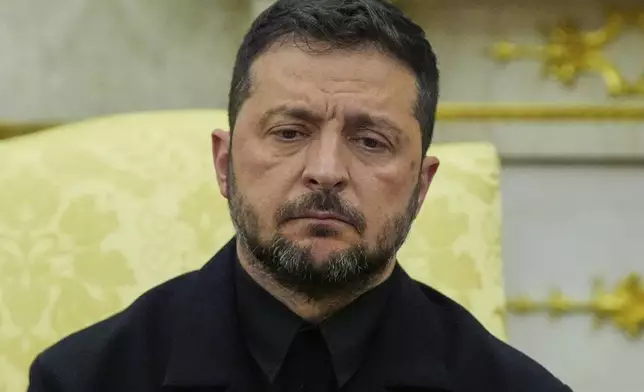 Ukraine's President Volodymyr Zelenskyy listens during a meeting with President Donald Trump in the Oval Office at the White House, Monday, Aug. 18, 2025, in Washington. (AP Photo/Julia Demaree Nikhinson)