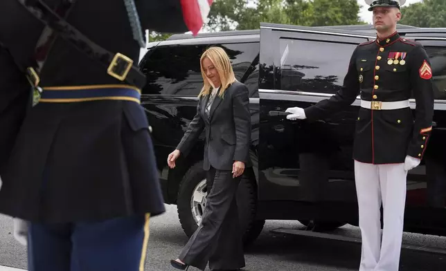 Italy's Prime Minister Giorgia Meloni arrives to meet with President Donald Trump and Ukraine's President Volodymyr Zelenskyy, Monday, Aug. 18, 2025, at the South Portico of the White House in Washington. (AP Photo/Jacquelyn Martin)