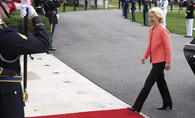 European Commission President Ursula von der Leyen arrives to meet with President Donald Trump and Ukraine's President Volodymyr Zelenskyy, Monday, Aug. 18, 2025, at the South Portico of the White House in Washington. (AP Photo/Jacquelyn Martin)