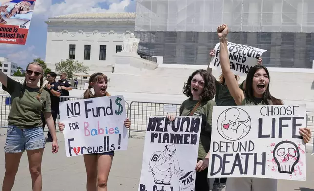 FILE - Anti-abortion protesters rally outside of the Supreme Court, June 26, 2025, in Washington. (AP Photo/Mariam Zuhaib, file)